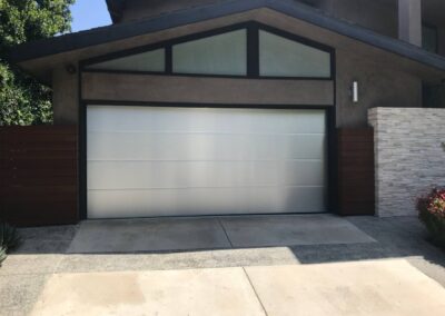 Modern garage door project with custom home design