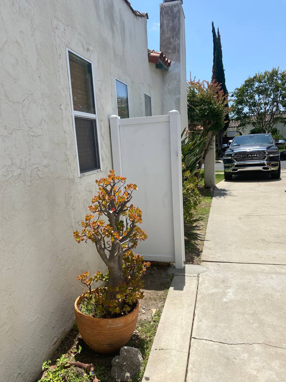 Van Nuys swing gate street approach view
